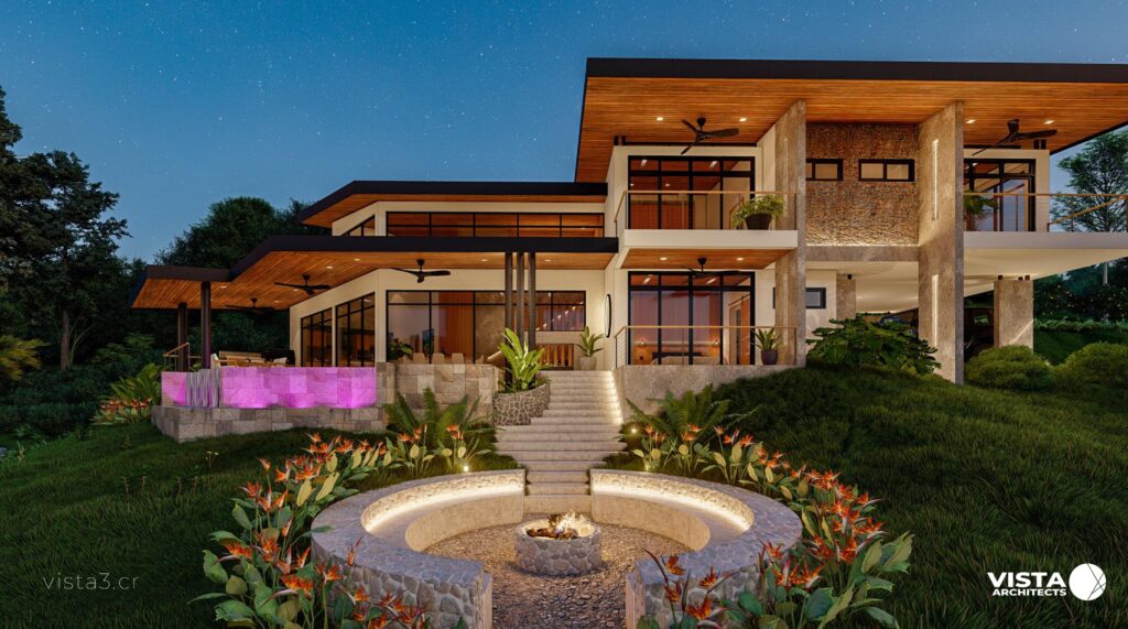 Side facade of a contemporary mountain house with warm textures, concrete walls, a firepit, and LED lighting.